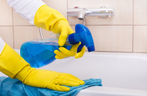 Technician discussing a carpet cleaning booking and service details