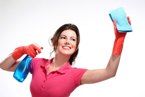 Trained carpet cleaner using protective gloves during service