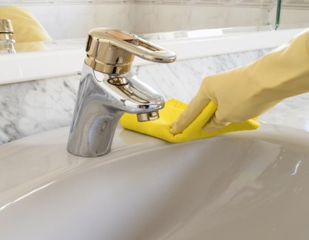Technician cleaning a carpet stain in South Hornchurch